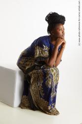 Dina Moses African Woman Sitting Pose